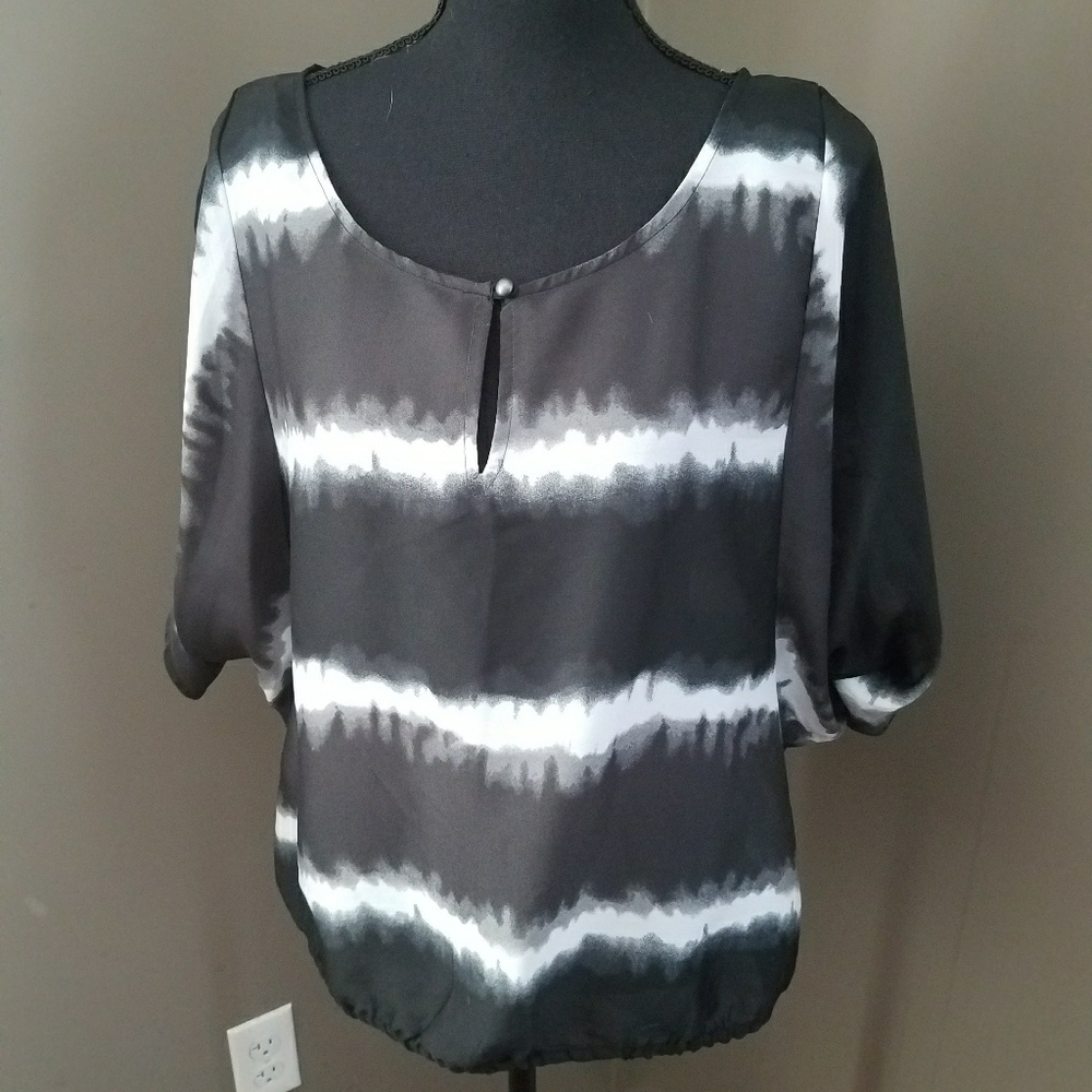 Beautiful sleeveless summer semi sheet blouse